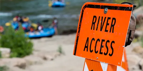 A sign reading 'River Access' on the Animas River in Durango